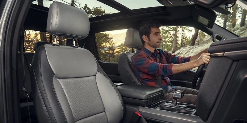 man driving the f-150 lightning