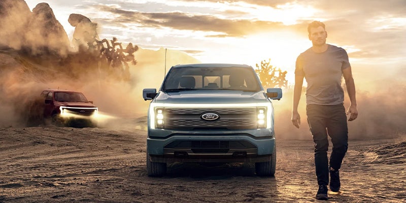 two men with the f-150 lightning