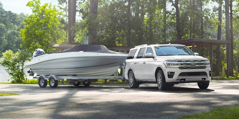 ford expedition towing a boat