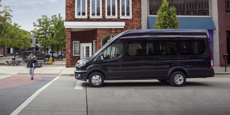 Ford Transit passenger van on a city street