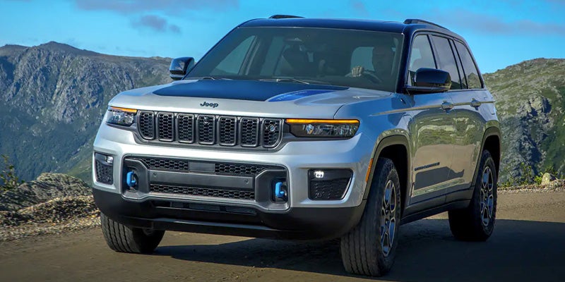 Blue Jeep Grand Cherokee 4xe plug-in hybrid SUV