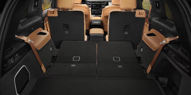 Jeep cargo area with all rear seats folded flat for maximum space