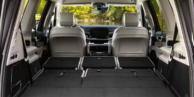 Third-row seating folded down revealing a large cargo area